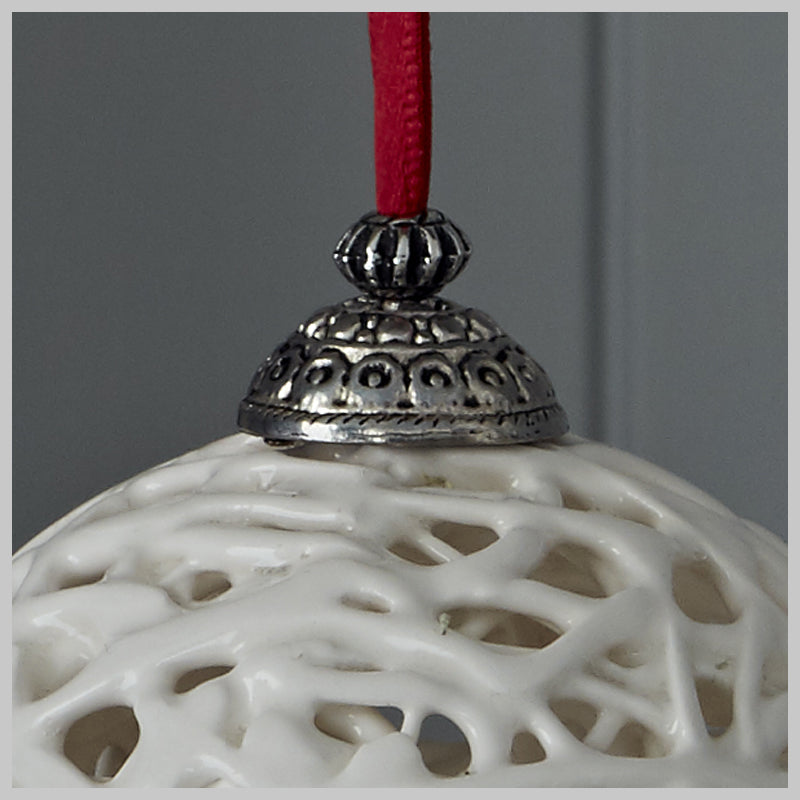 Tangled Web Bauble with Red Ribbon